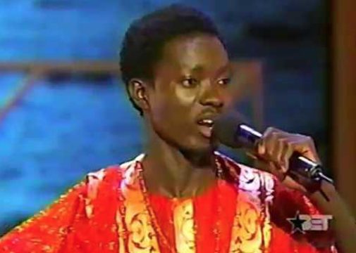 Michael Blackson performing live on stage
